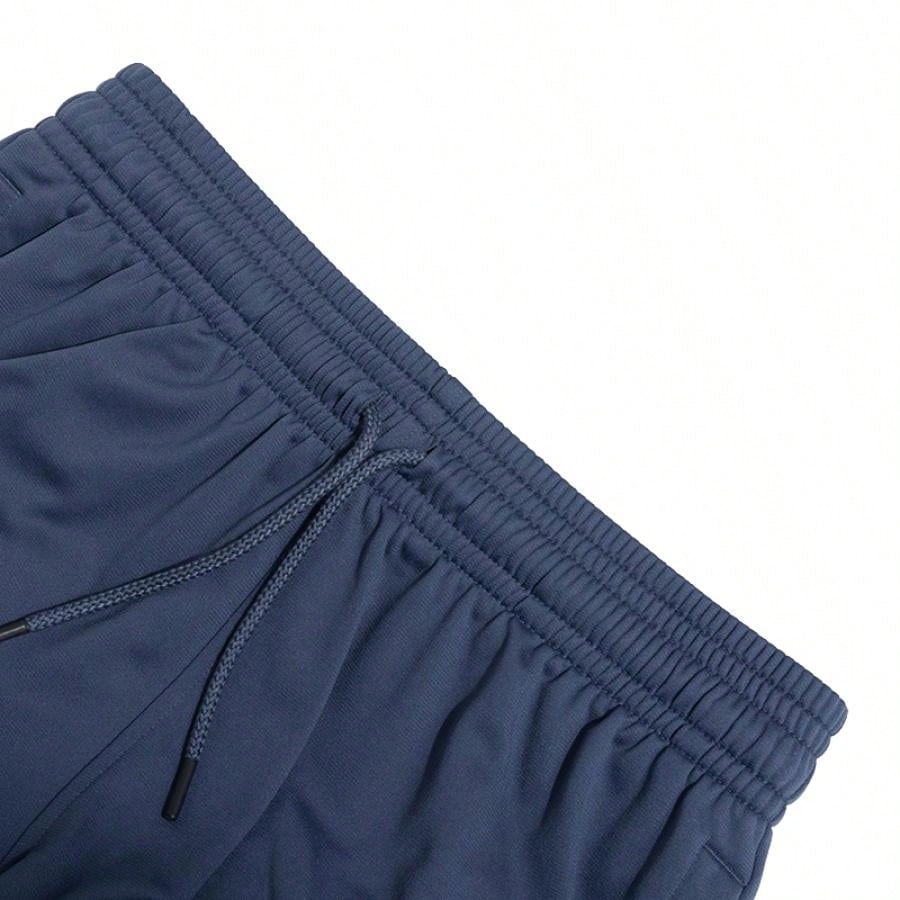 Pantaloni UNDER ARMOUR, albastru