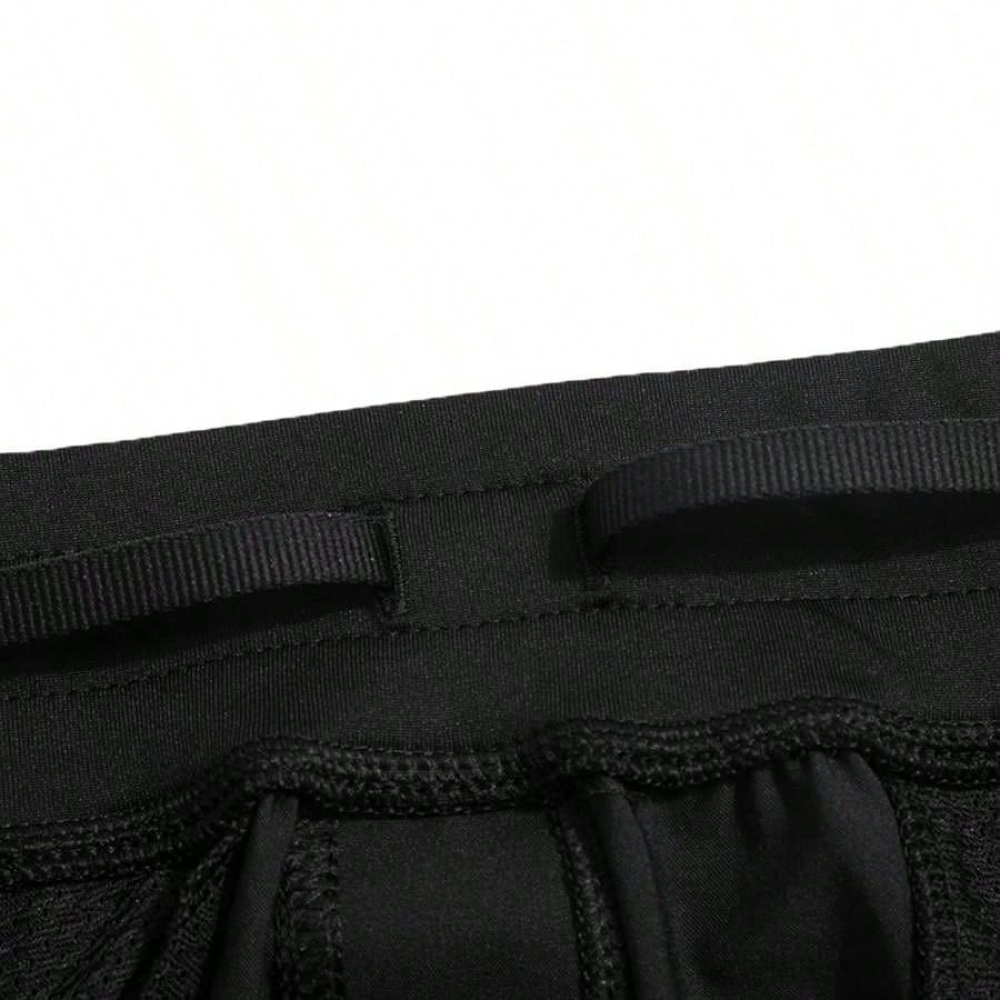 UNDER ARMOUR nadrág, fekete
