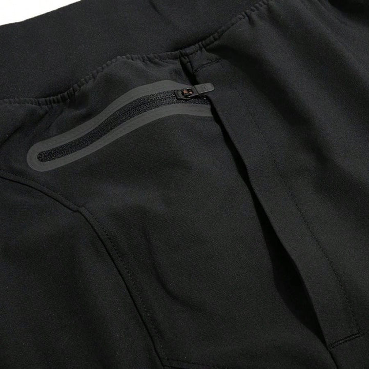 UNDER ARMOUR nadrág, fekete