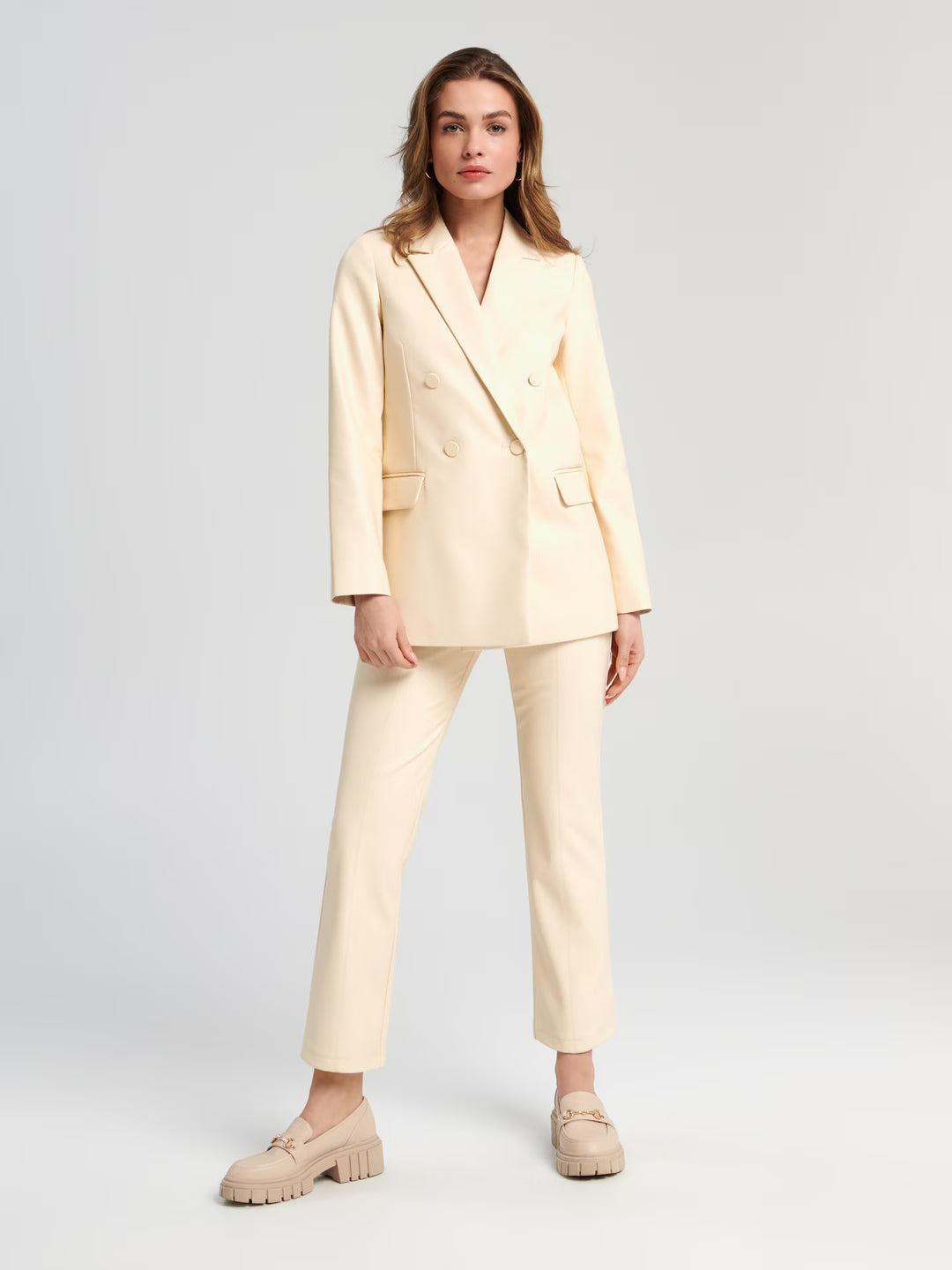 Pantaloni imitație piele SINSAY, crem